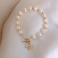 Baroque natural pearl bracelet with a zircon bee charm and elegant gold OT toggle clasp - 1158# Small Bee Natural Pearl Bracelet