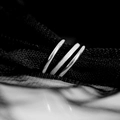 Set of three minimalist stackable silver rings featuring polished and frosted textures - US 9 / Steel
