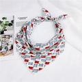 Detail shot of a geometric pattern silk scarf with red and blue accents on a white base - White Frame Line Style