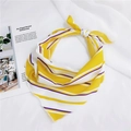 Close-up of yellow and white striped silk scarf with fine rolled edges on white fabric - Yellow Stripe