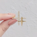 Close-up of a double star brooch in gold with sparkling inlaid zircon and polished finish - Micro-inset Small Star Brooch (D)