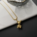 Collana dorata con pendente a coniglio a trama puntinata e catena a maglia veneziana - Stile Coniglio Dorato