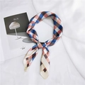 Close-up of knotted colorful checkered silk square scarf with premium smooth texture - 70cm / Royal Blue Grid