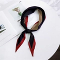 Navy blue, red and khaki spliced silk scarf with white dotted lines on a white table - Black Red Patchwork