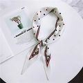 Polka dot silk scarf in white with red and black accents tied on a decorative tray - White Two-tone Polka Dot