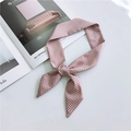 Pink polka dot silk scarf tied in a bow on a white desk with magazine background - Pink Small Polka Dot