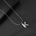 Gepolijste zilveren bubble letter K hanger ketting van roestvrij staal voor dames - Letter K / Met Slangenketting