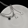 Dettaglio della collana a doppio strato con ciondolo a forma di orso nero e charms argento - Orsetto a Doppio Strato (37#HJ)