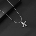 Zilverkleurige X-vormige bubbel letter hanger ketting met een gladde slangenketting - Letter X / Met Slangenketting
