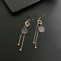 Rose gold tassel earrings with black round pendant and Love engraving on dark surface - Love Letter Round Tassel Style / Rose Gold & Black