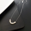 Minimalist silver chain necklace with seven baroque pearls on a modern background - Silver(04-K9)
