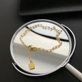 Gold paperclip chain anklet featuring a square pendant on a reflective mirror base - Paperclip Chain Square Pendant Style (02-K7#) / Gold