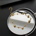 Double-layered 14K gold bead bracelet with polished golden balls on a mirror surface - Titanium Steel Transfer Bead Bracelet (05-K10)