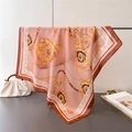 Detail of pink silk scarf with gold chain print and baroque pattern draped on a rack - 70x70cm / Brown Edge Orange Pink (FG134-2)