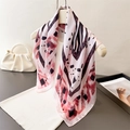 Pink silk-like scarf with zebra patterns and red tie-dye accents on a clothing hanger - 66-70CM / Pink