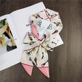 Elegant cream and pink skinny silk scarf with retro key prints tied in a bow - 15 Pink with Key Pattern