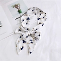 White silk skinny scarf with blue berry floral pattern tied in a bow on a white background - 32 White with Small Floral