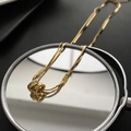 Double-layered gold necklace featuring interlocking zircon circles on a mirror surface - Double Layer Luck Style (820) / Gold