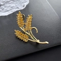 Spilla a spiga di grano dorata con pietre di zircone giallo su fondo nero testurizzato - Design Spiga di Grano (71#XZ)