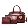 Three-piece burgundy tote set featuring embossed crocodile texture and gold hardware - Red