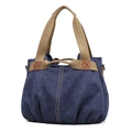 Navy blue canvas tote bag with brown leather accents and reinforced woven handles - Navy Blue