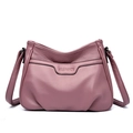 Elegant dark pink embossed leather crossbody bag with adjustable shoulder strap - Purple