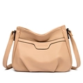 Chic apricot faux leather crossbody bag with embossed texture and adjustable strap - Khaki