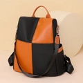 Mochila casual para mujer con diseño de bloques de color naranja y negro en nailon - Negro
