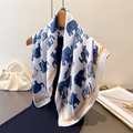 Exotic retro elephant print silk square scarf with orange chain border on a hanger - Navy Blue (FG177-2)