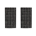 Close-up of geometric curved earrings with black rhinestones in a dark metal setting - Black