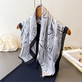 Elegant palm leaf print silk-like square scarf in black and white on a wooden hanger - 70cm x 70cm / Black Gray (FG233-3)