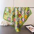 French oil painting style floral square silk scarf displayed on a luxury metal rack - Standard Size / Green