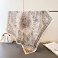 Detail of elegant paisley silk-like square scarf draped on a rack for a luxury feel - 66-70cm / Brown (FG198-1)