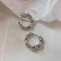 Detailed close-up of silver twisted hoop earrings with a textured braid design on white - Twisted Texture Style (C115) / Silver (C115)