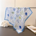 Detail of silk square scarf showing ocean print with palm trees and corals on a white base - One Size / Blue (FG176-3)