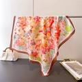 Detailed close-up of a floral silk scarf showing vibrant lily and butterfly patterns - 70cm*70cm / Coffee (FG238-2)