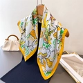 Elegant floral print silk scarf with yellow borders styled on a wooden hanger - 66-70CM / Yellow