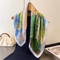 Artistic lotus print faux silk square scarf draped on a wooden hanger with a handbag - Green (FG257-2)