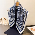 Navy and white polka dot silk-like square scarf draped over a wooden hanger - 70x70cm / Navy Blue