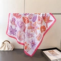 Detail of floral printed satin silk scarf featuring vibrant tulip patterns and rolled edges - FG298-3 Pink / Pink