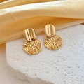 Golden hollow mesh round drop earrings on stone display with elegant yellow silk fabric - Gold Round Style (G219)