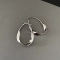 Polished silver Mobius hoop earrings with a twisted drop design and secure clasp closure - Silver (D224)