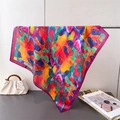 Macro view of multi-color watercolor print silk scarf with fine rolled edge detailing - Reddish Purple Edge