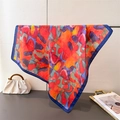 Detail view of colorful abstract watercolor silk scarf with navy satin border edge - Navy Blue Edge