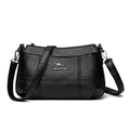 Black leather crossbody bag with kangaroo logo and decorative stitching on white background - Black