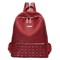 Modischer bordeauxroter Damen Rucksack mit Nieten aus wasserfestem Stoff und Trägern - Rot