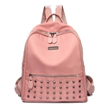 Rosa Damenrucksack mit Metallnieten aus wasserfestem Kunstleder im modischen Trenddesign - Rosa