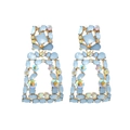 Detail of geometric AB rhinestone earrings with blue stones and gold-toned frames - Light Blue