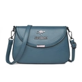 Deep teal minimalist faux leather crossbody bag for women with kangaroo logo and metal tag - Blue