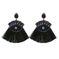 Handgemaakte zwarte kwastjes oorbellen met evil eye motief en blauwe kralen afwerking - Zwart